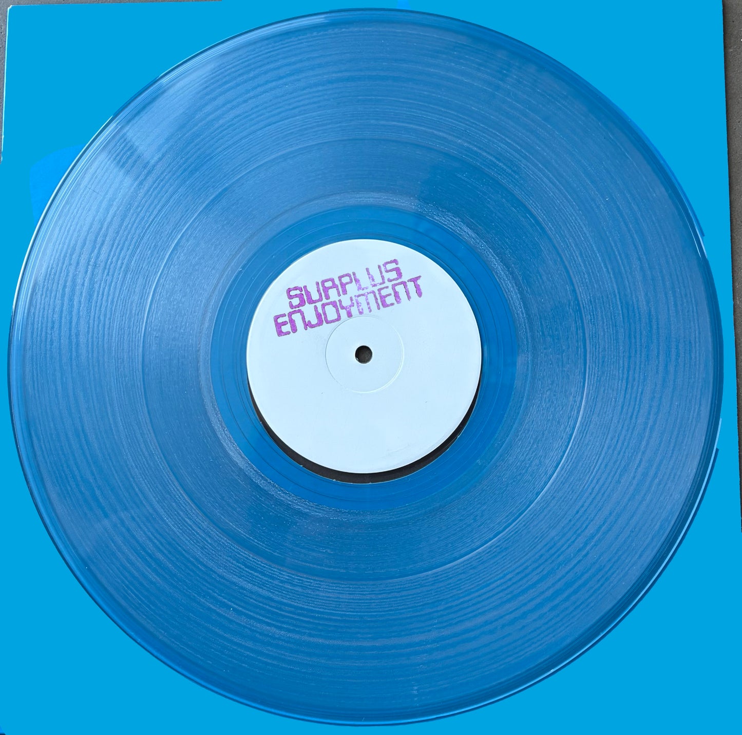 V/A - SURPLUS ENJOYMENT (HAND-STAMPED CLEAR VINYL 12")