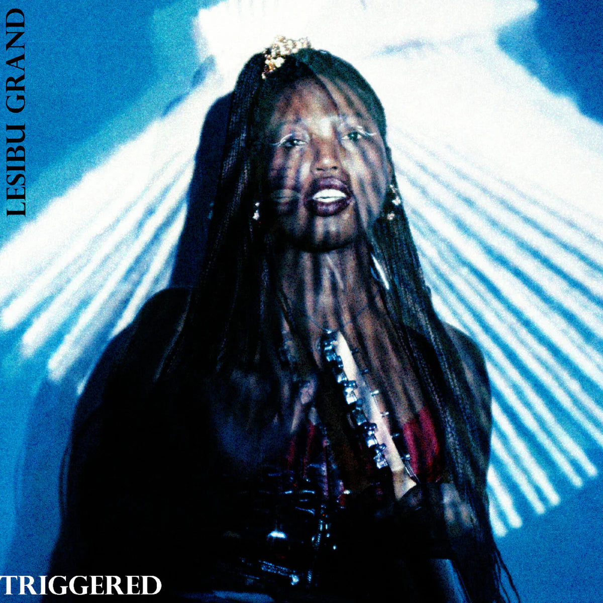 Lesibu Grand - Triggered [CD 8-Panel Lyric Sheet]