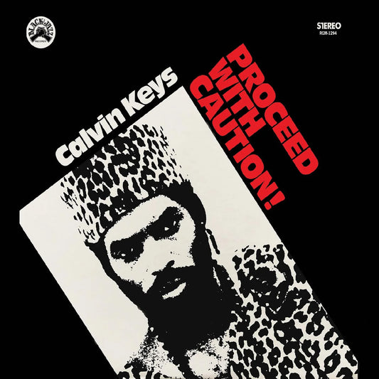 CALVIN KEYS - PROCEED WITH CAUTION (REMASTERED EDITION) (ORANGE & BLACK STREAKS VINYL)