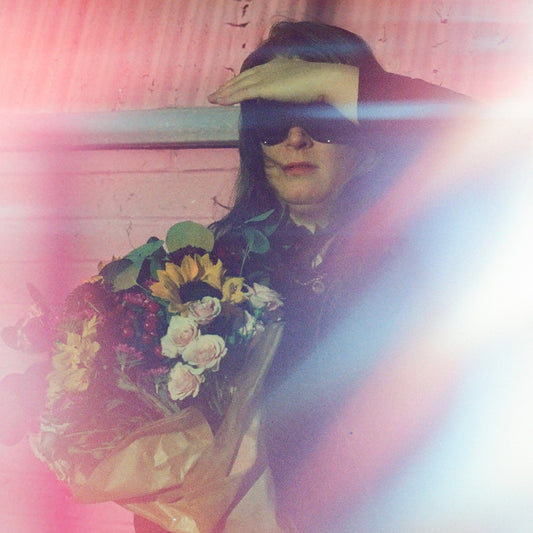 Mariel Buckley - Strange Trip Ahead [Milky Clear w/ Ruby Red Splatter]